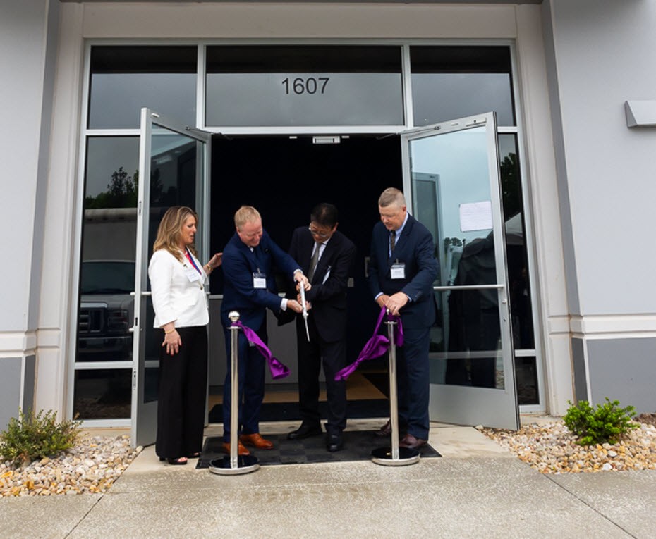 Our Chairman Chikara Kurimata-san and CEO Robert Neilson cutting the ribbon, joined by our Vice President, Biopharma Clifford Wyllie(right) and Business Development Executive Christine Smith(left), at the RDU Grand Opening Ceremony
